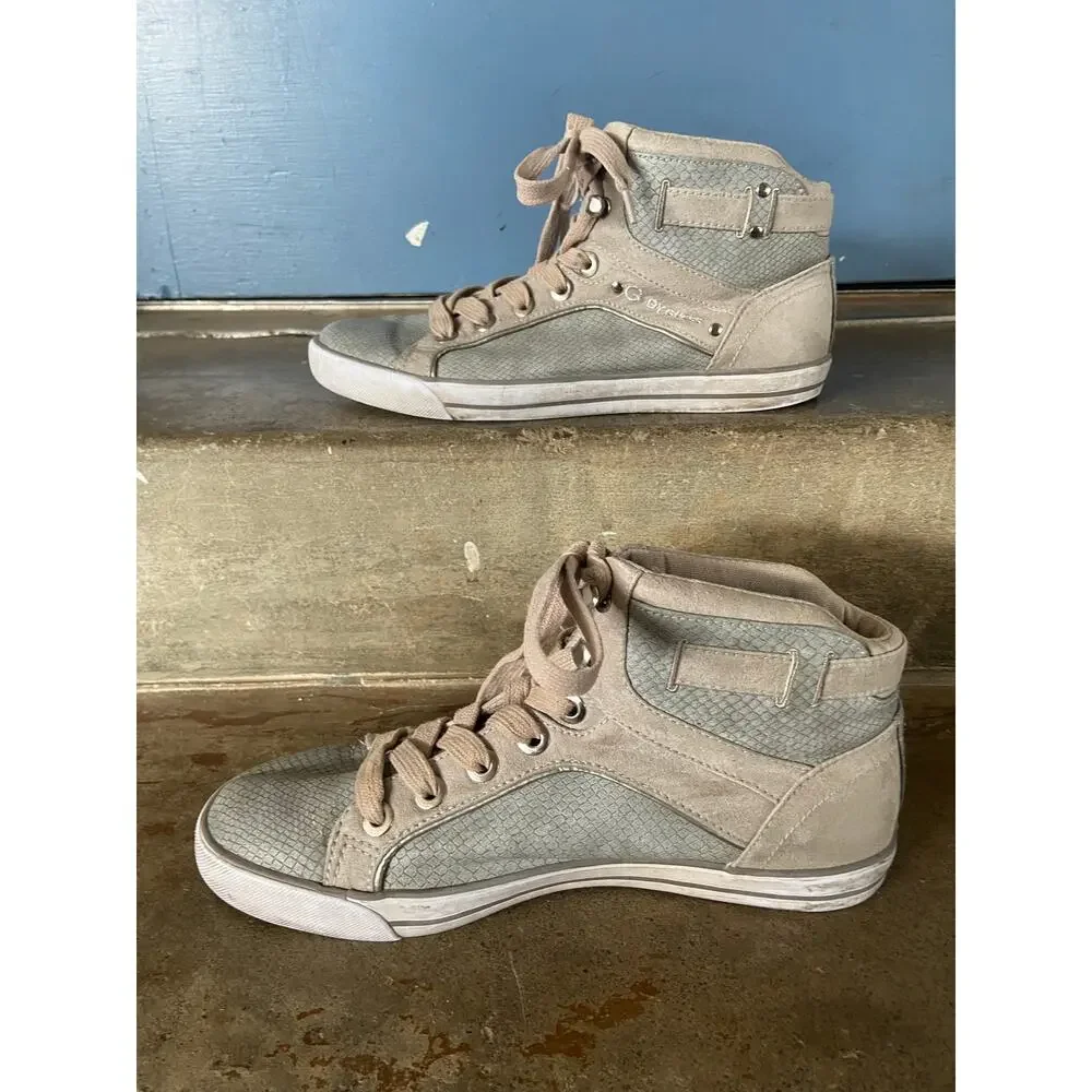G by Guess Opall 12 mid-top 2 tone sneakers w/ faux-snakeskin pattern.